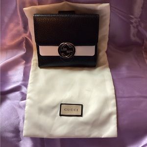 Brand new Gucci black wallet, in garment sleeve, no longer have box .